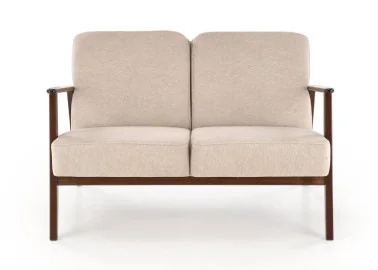 Dviejų vietų sofa su tvirtu mediniu rėmu ir kreminės spalvos pagalvėlėmis.

Tai minimalistinio ir klasikinio stiliaus baldas, idealiai tinkantis elegantiškam ir jaukiam interjerui, siūlantis patogumą bei stabilumą.