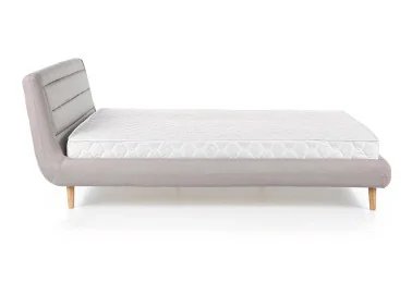 Šiuolaikinio dizaino pilkos spalvos lova Elanda, pasižyminti minimalistinėmis ir švariomis linijomis. Idealus pasirinkimas norintiems suteikti savo miegamajam modernų ir elegantišką įvaizdį.