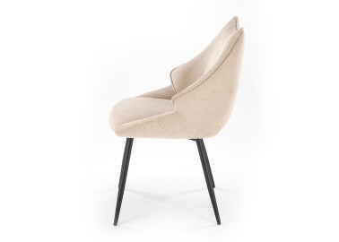Smėlio spalvos elegantiška išskirtinės formos valgomojo kėdė K543. Kėdė apsiūta aukštos kokybės gobelenu, o kojelės pagamintos iš milteliniu būdu dažyto plieno.