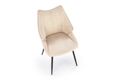 Smėlio spalvos elegantiška išskirtinės formos valgomojo kėdė K543. Kėdė apsiūta aukštos kokybės gobelenu, o kojelės pagamintos iš milteliniu būdu dažyto plieno.