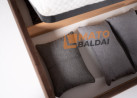 Smėlio spalvos lova KAI-ETN-2 - elegantiško dizaino dvigulė funkcionali lova su patalynės dėže, kietu dugnu ir natūralios medienos grotelėmis. Lova skirta 160x200 cm čiužiniui.