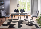 Valgomojo stalas RION – modernus ir stilingas pasirinkimas, sukurtas tiems, kurie vertina šiuolaikišką dizainą bei patvarumą. Baltos marmuro imitacijos keraminis stalviršis derinamas su juodo metalo rėmu, todėl baldas atrodo elegantiškai ir kartu solidžiai.